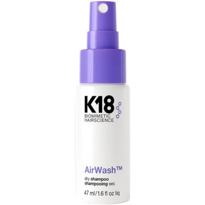 K18 AirWash dry shampoo bottle with purple cap on a white background