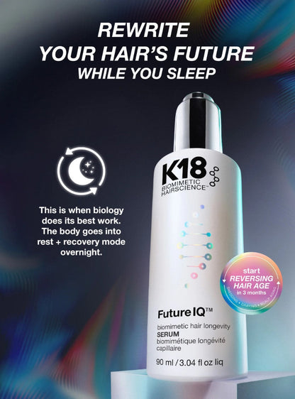 K18 Future IQ hair serum bottle on a dark blue and black background with colorful abstract waves. The bottle is white with a black cap and black text, including 'K18' and 'biomimetic hair longevity'.