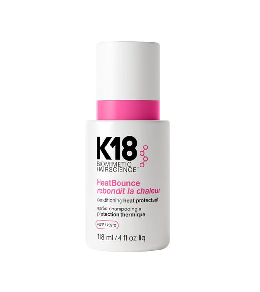 a bottle of K18 HeatBounce conditioning heat protectant bottle on a white background