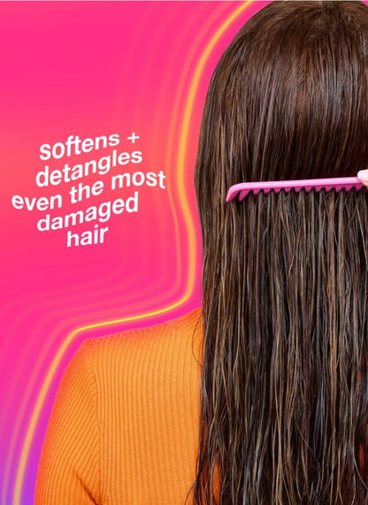 a model using K18 haircare product showing soft detangled hair 