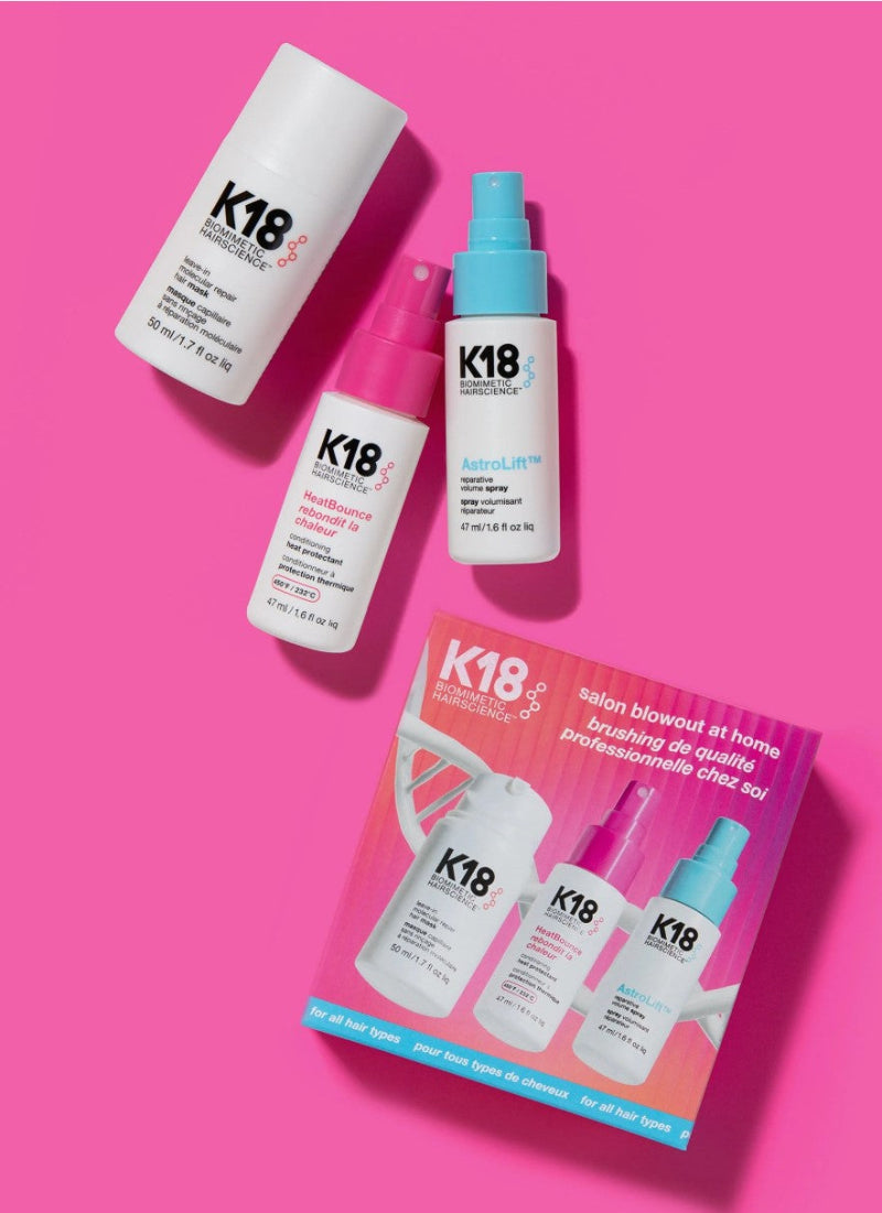 K18 Salon blowout at home package shown on a pink background