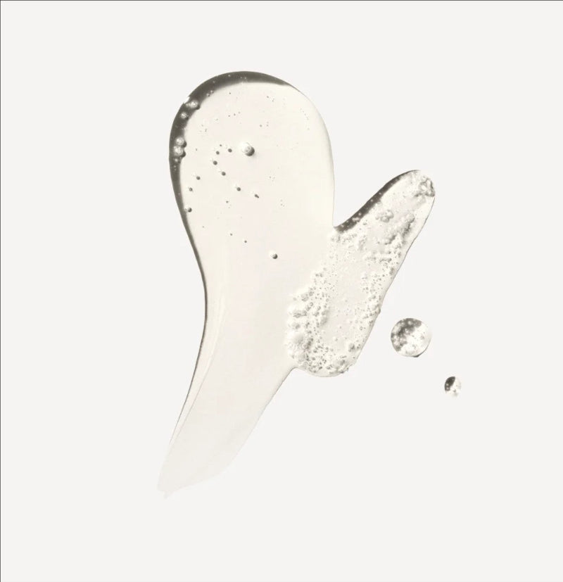 Olaplex nourishing hair serum drop showing on a white background