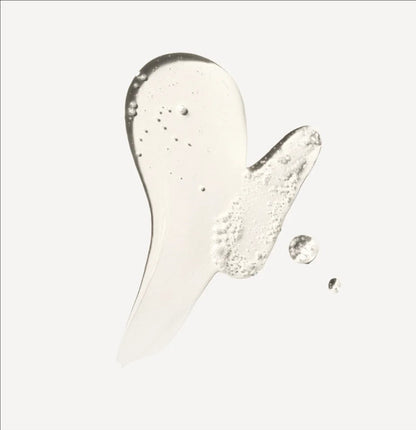 Olaplex nourishing hair serum drop showing on a white background