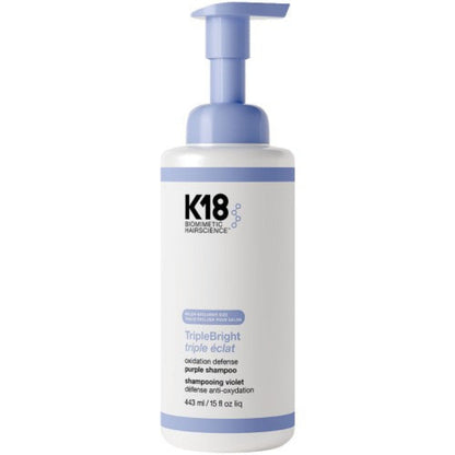 K18 hair care product bottle with pump on a white background