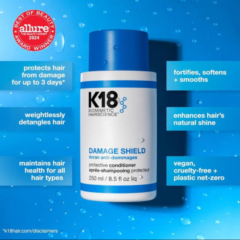 K18 Biometic Hairscience Damage Shield serum anti-damage protective conditioner bottle on a blue water-textured background with feature callouts and an Allure award badge.