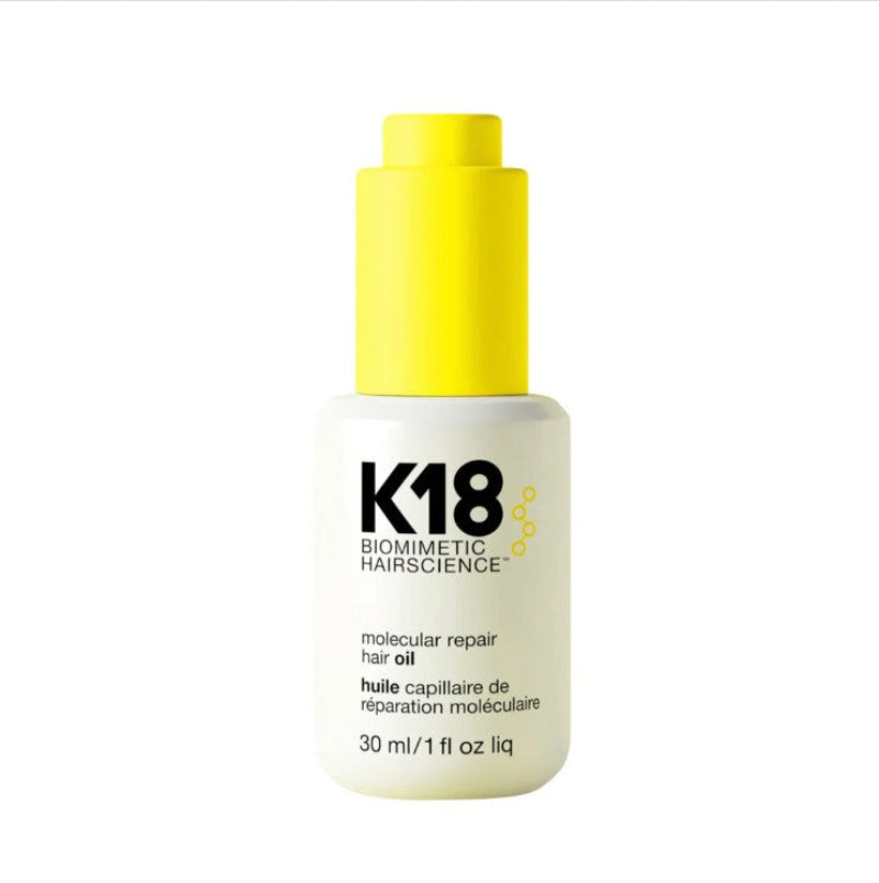 K18 Biomimetic Hairscience Molecular Repair Hair Oil 30 ml in a white bottle with a bright yellow cap, on a white background.
