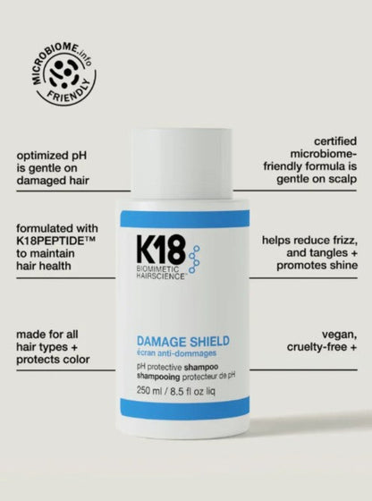 A bottle of K18 Damage Shield vegan cruelty-free shampoo centered on a light gray background, surrounded by black text callouts highlighting product benefits such as optimized pH, K18 peptide formula, reduced frizz and tangles, and vegan/cruelty-free status.